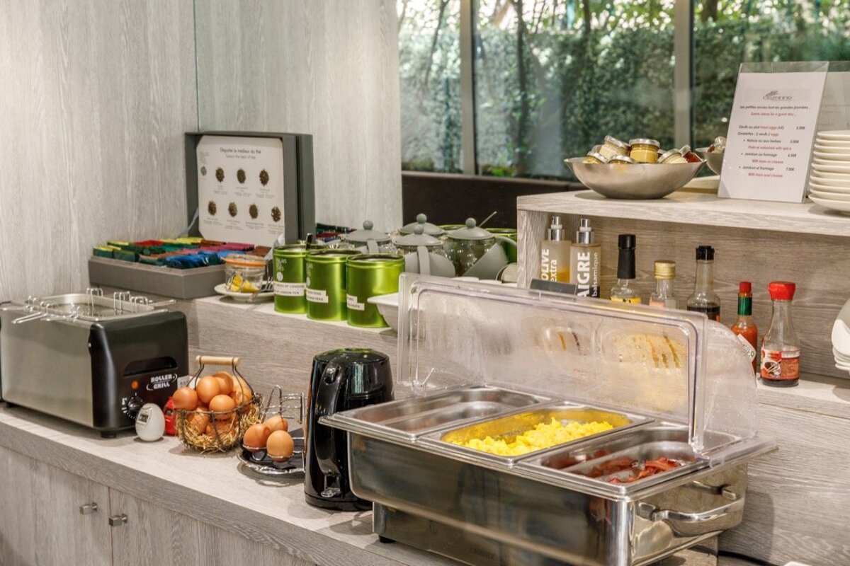 A buffet with a sign that says olive oil gre