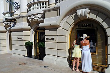 two women window shopping at chanel in monte carlo