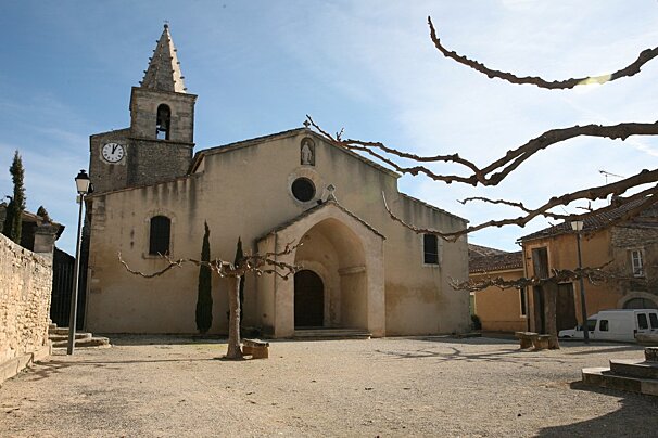 A church with a clock on the top of it