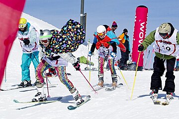 skiers in a fun races on the slopes