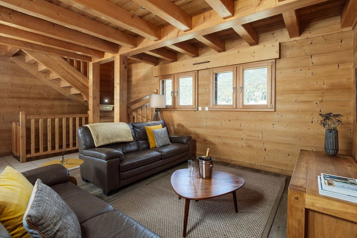 A living room with a couch and a coffee table