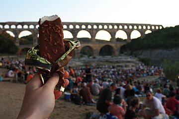 an ice cream while watching the pont du gard light show