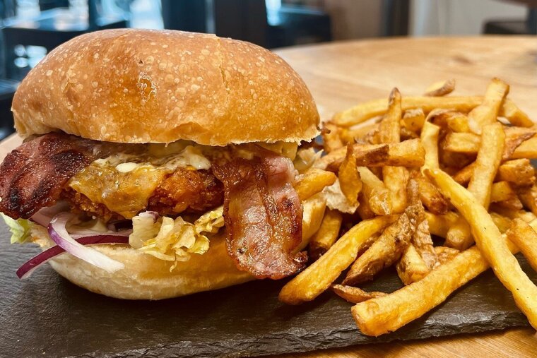 loaded burger with fries at Home Burgers in Les Gets