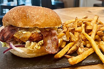loaded burger with fries at Home Burgers in Les Gets