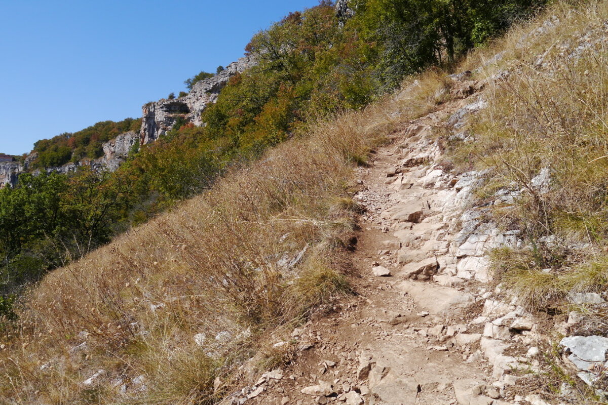 a path leading up to cliff in autoire