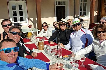 people sat in the sun at lunch