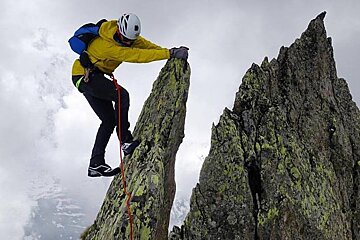 Climber in the clouds