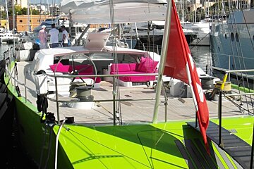 a brightly coloured yacht in Palma marina