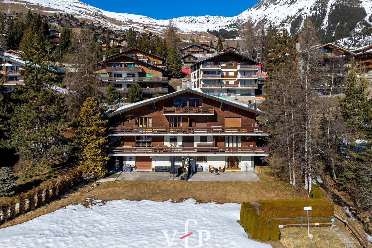 An aerial view of a house with the vip logo on the bottom