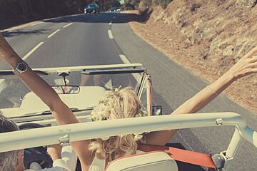 a bride in a jeep on cote d'azur road