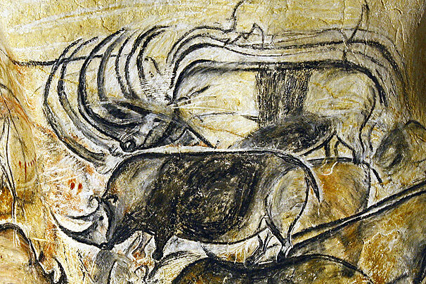 cave painting of rhinos