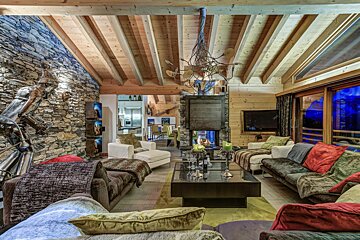 A living room filled with furniture and a fireplace