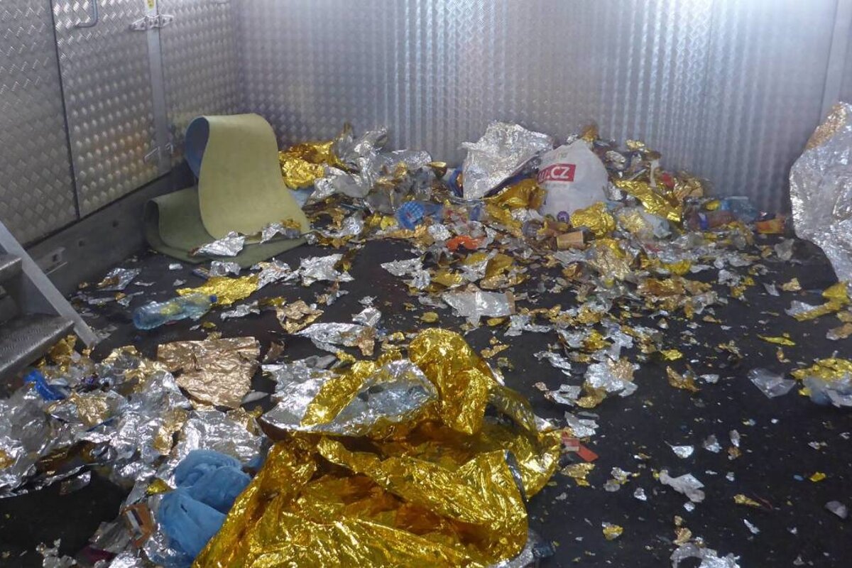 a room with space blankets ripped up