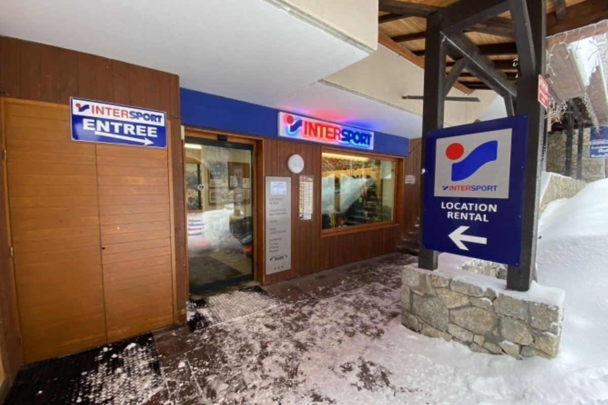 An Intersport ski rental shop is shown with 