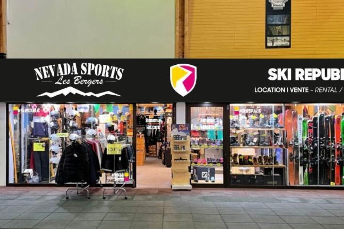 A dual storefront for Nevada Sports and Ski Republic, displaying ski equipment, boots, and winter apparel for sale and rental.