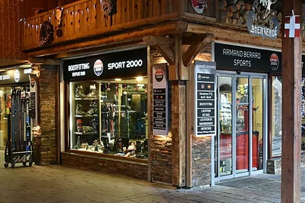 A cozy, brightly lit chalet-style ski and sports shop,