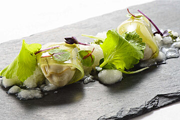 A close up of a plate of food on a table