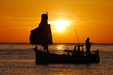 fishing boat at sunset benirras ibiza
