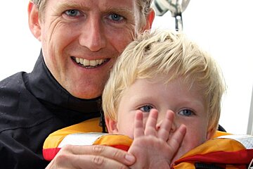 a father and his blond haired son