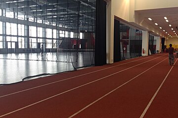 a n indoor running track at tignespace