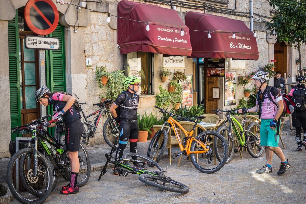 A man in a pink shirt with the number 8 on it