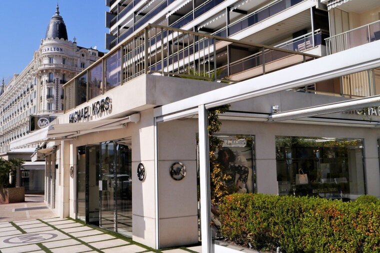 the outside of Michael Kors boutique in cannes