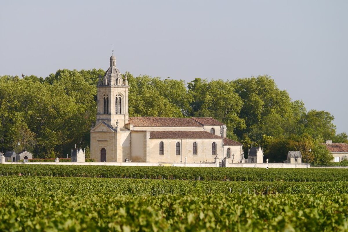 looking over vineyards to st michel church at chateau margaux