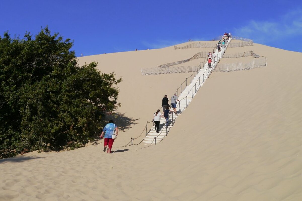 a staircase on a huge sanddune in bordeaux region