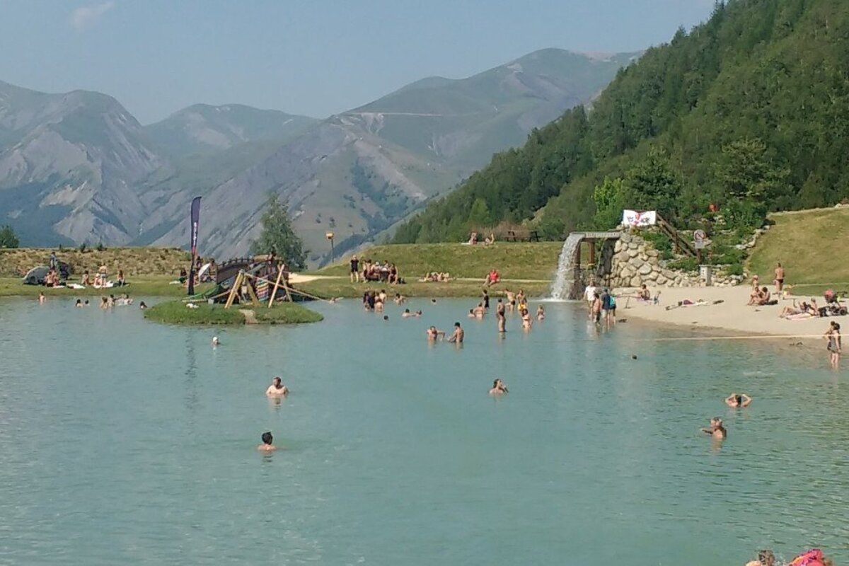 a swimming lake in les 2 alpes