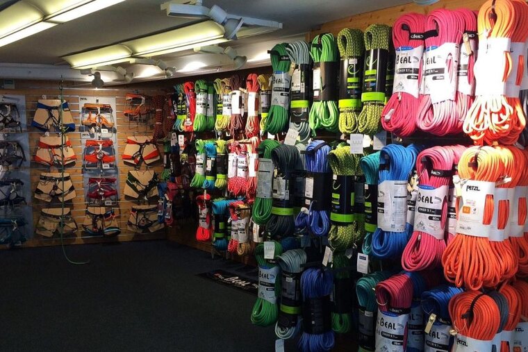 Climbing ropes and harnesses in a Chamonix mountain shop