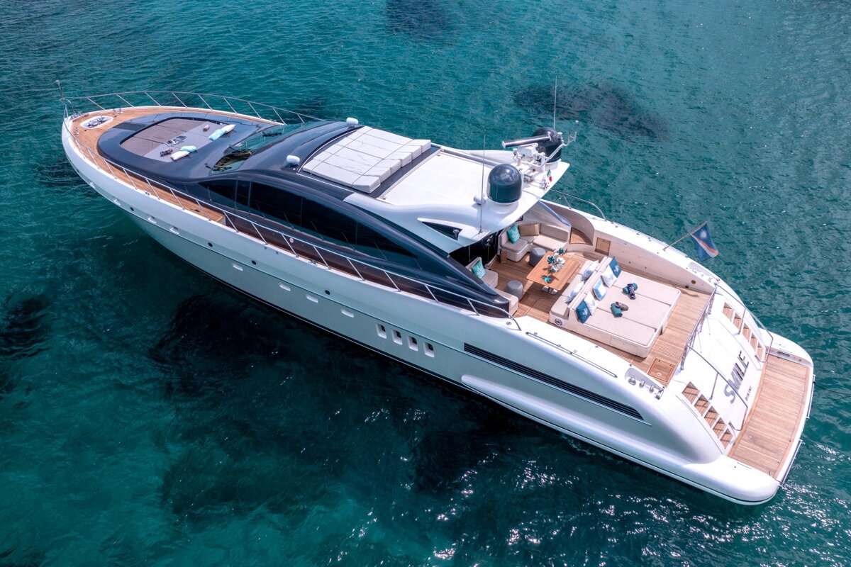 An aerial view of a large yacht with the name shark on the back