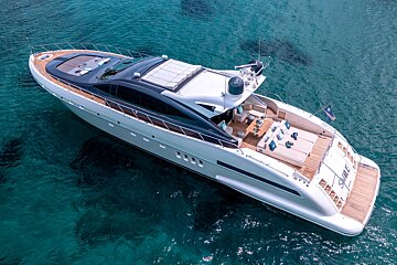 An aerial view of a large yacht with the name shark on the back