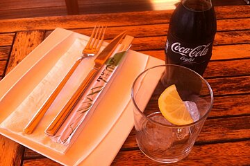 a plate with a choice of forks or chop sticks