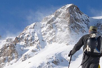 a skier heading towards a mountain