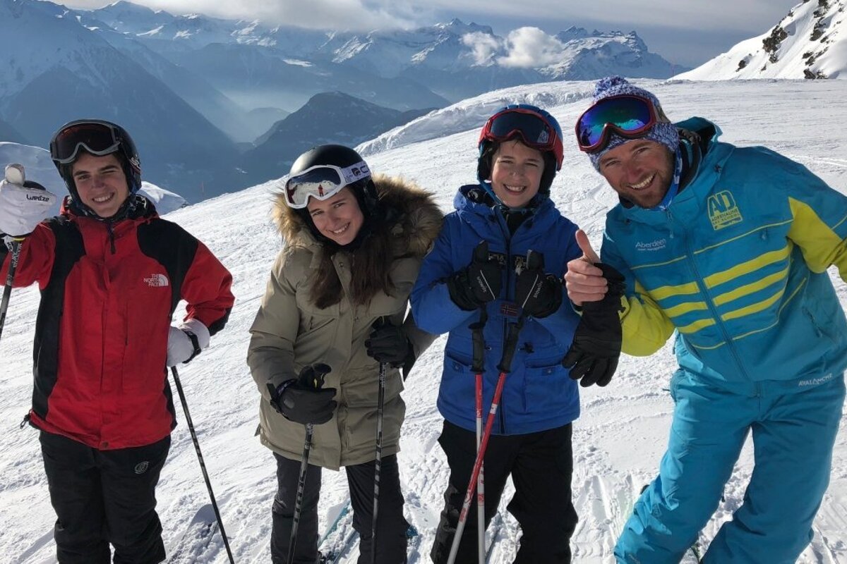 a ski instructor giving a private lesson