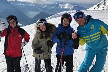 a ski instructor giving a private lesson