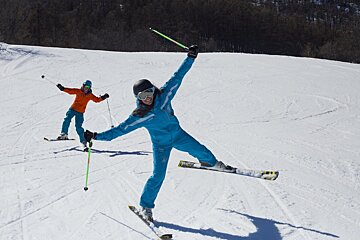 a ski instructor giving a private lesson