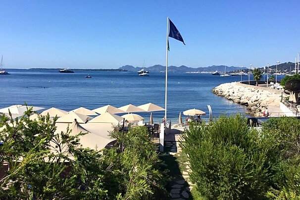 a view of the cap d'antibes beach club, plage du crouton