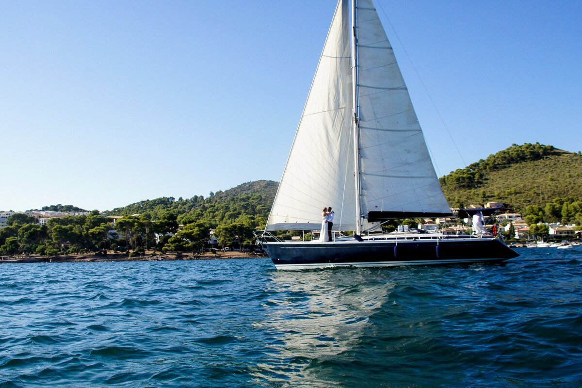 A sailboat is floating on a body of water