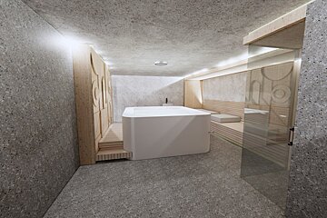 A bathroom with a bathtub and a glass door