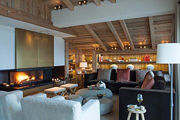 A living room with a fireplace and a couch