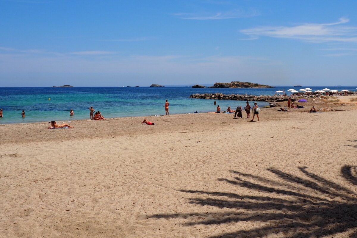 Sandy beach is longer than it looks at Figueretes Ibiza