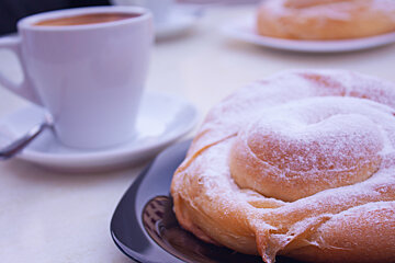 a coffee and an Ensaimada