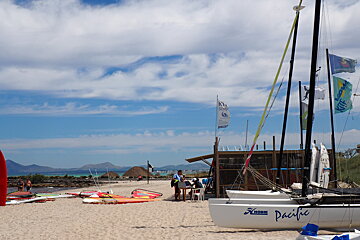 A white boat with the word pacific on it