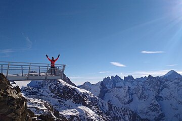 a man with his arms in the air