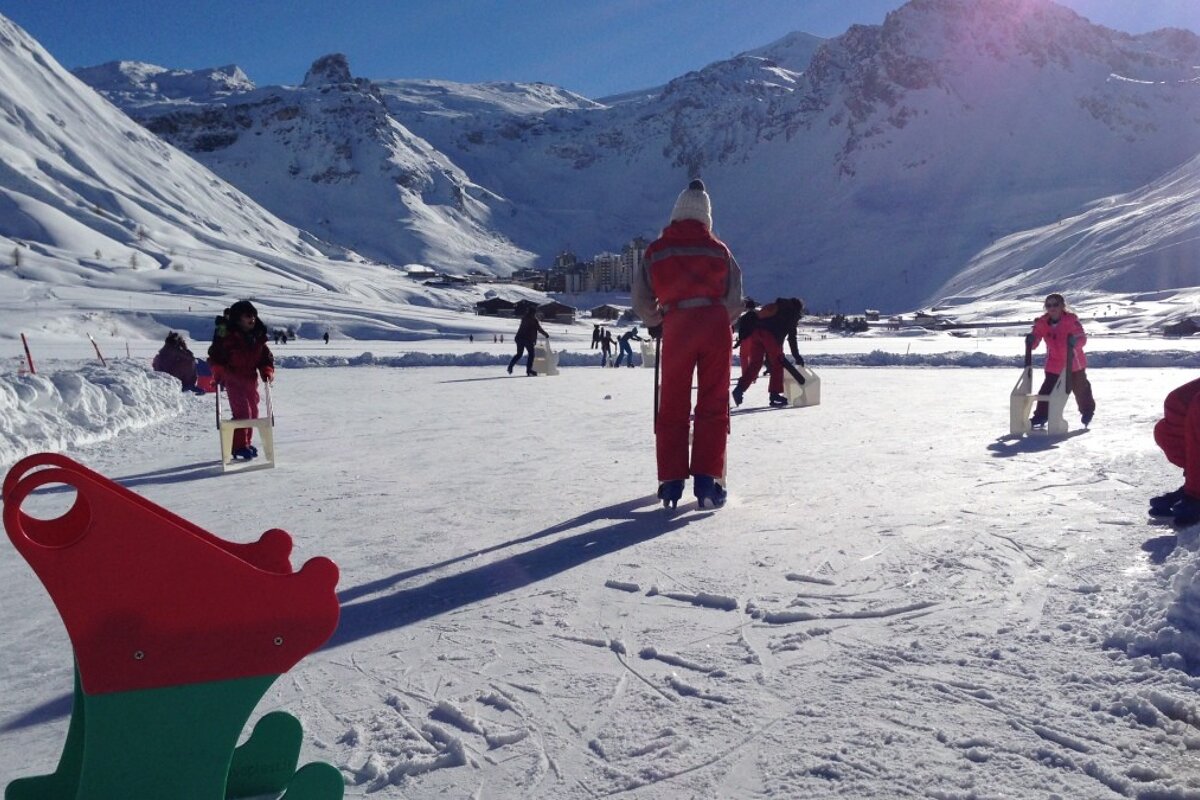people skating in the sunshine