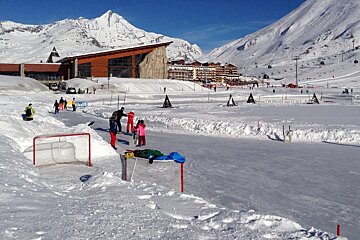 hockey nets at the side of an ice rink