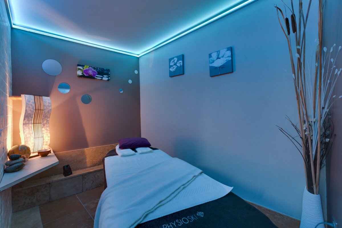 A massage table with the word physio on it