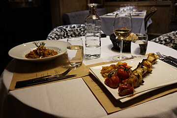two meals of food in a restaurant in les gets