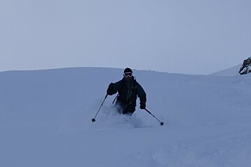 a skier in the dark